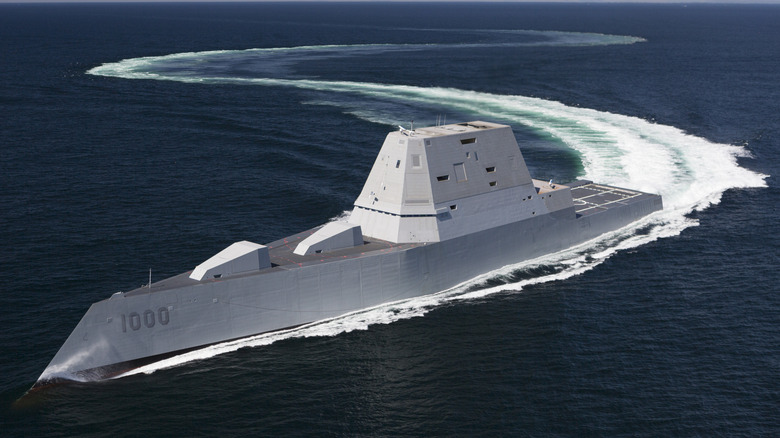 The USS Zumwalt takes a curving route through the open ocean.