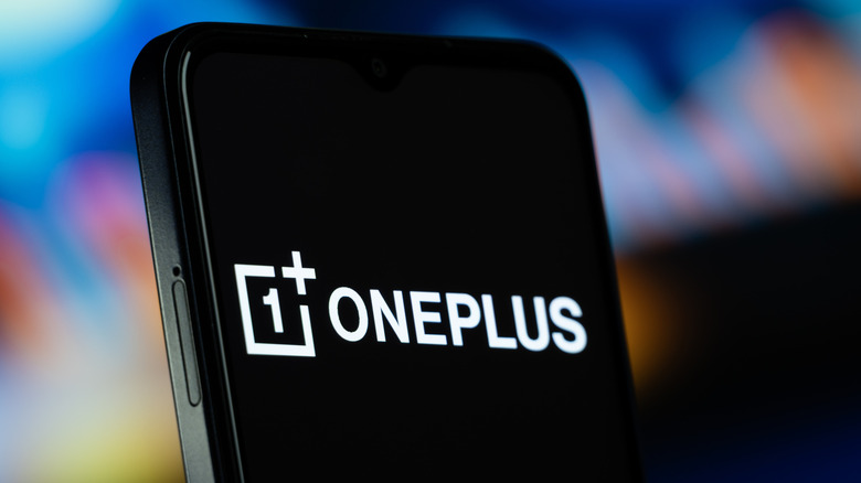 OnePlus logo on smartphone screen