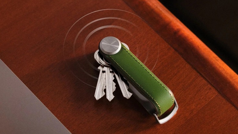 Orbitkey Key Organizer Tracker on table showing sound waves
