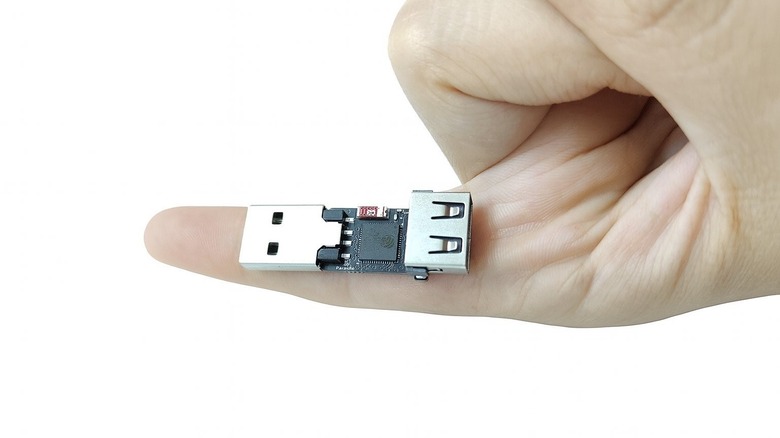 Diabolic Parasite USB tool resting on a finger.