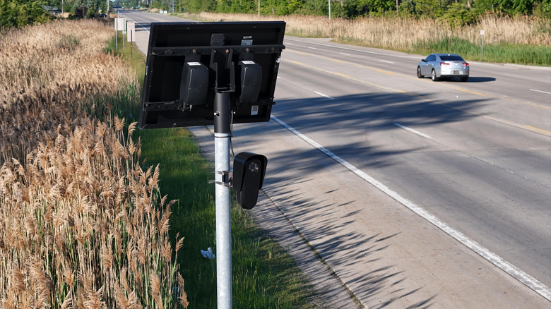 a Flock traffic camera alongside a road