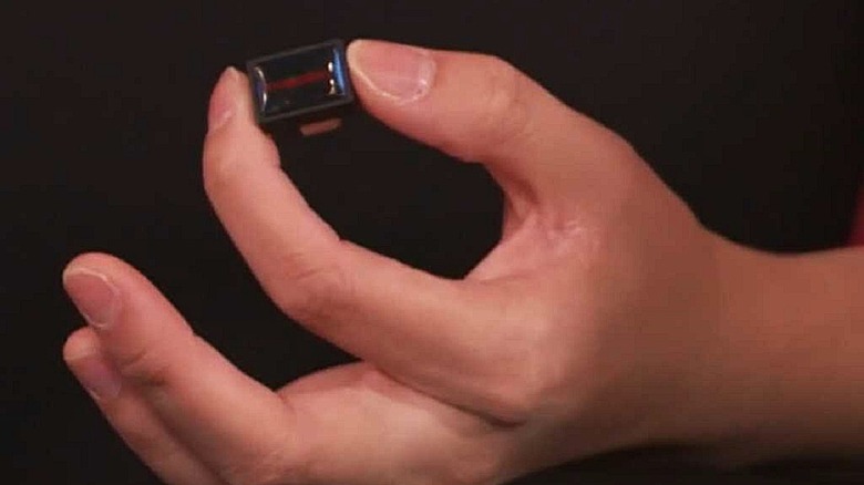 Sandisk representative holds up Ultra Fit USB-C flash drive
