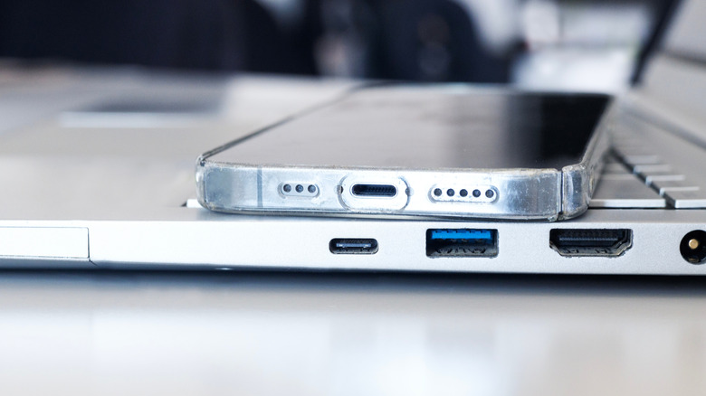 USB-C ports on a laptop and smartphone