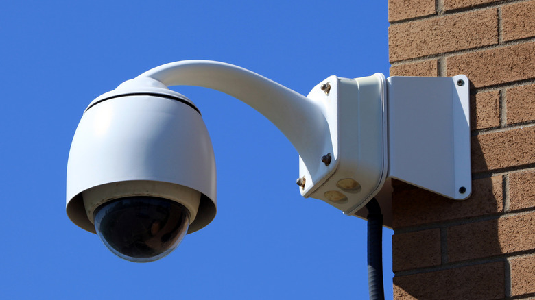 Dome security camera installed outside