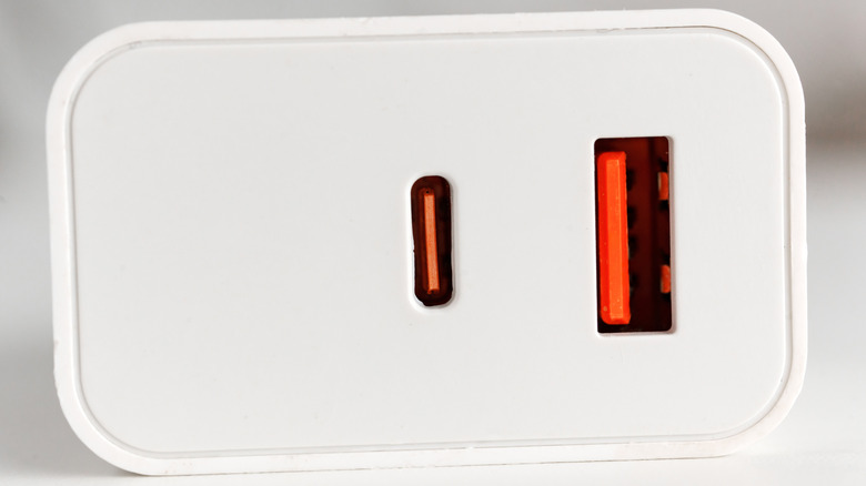 A photo showing a charger with a USB Type-A port and a USB Type-C port.