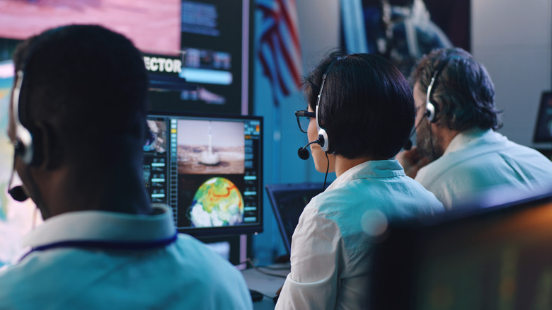 People in mission control