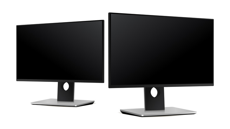 Two monitors side by side on a white background.