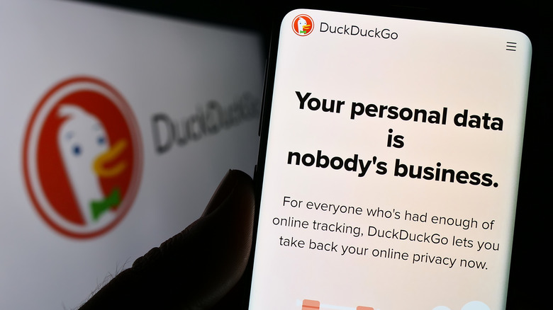 Smartphone with DuckDuckGo on screen