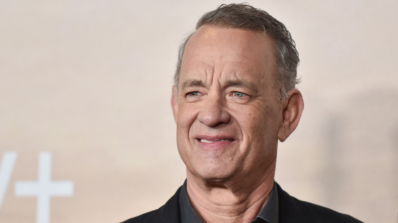 A close up of Tom Hanks smiling