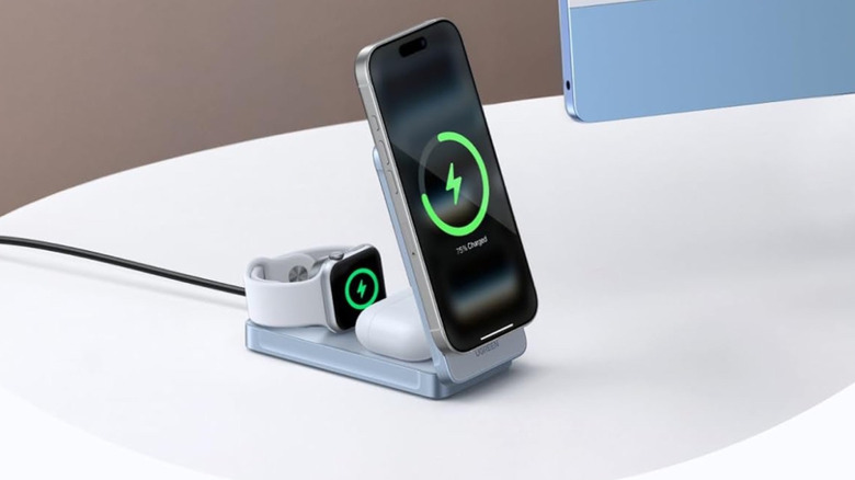 The UGREEN MagFlow Duo 2-in-1 Wireless Charger placed on a desk.