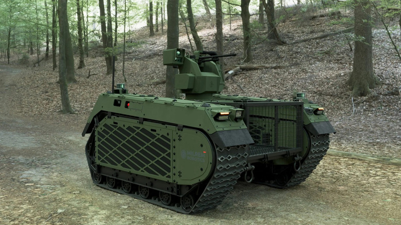 An Estonian TheMIS UGV in the forest.