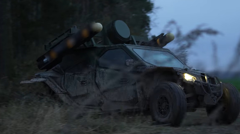 The Tempest zooms across a wooded area showcasing its multi-terrain functions.