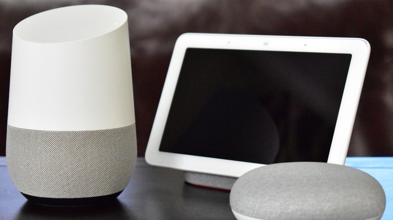 Google Home devices and smart speakers on a table