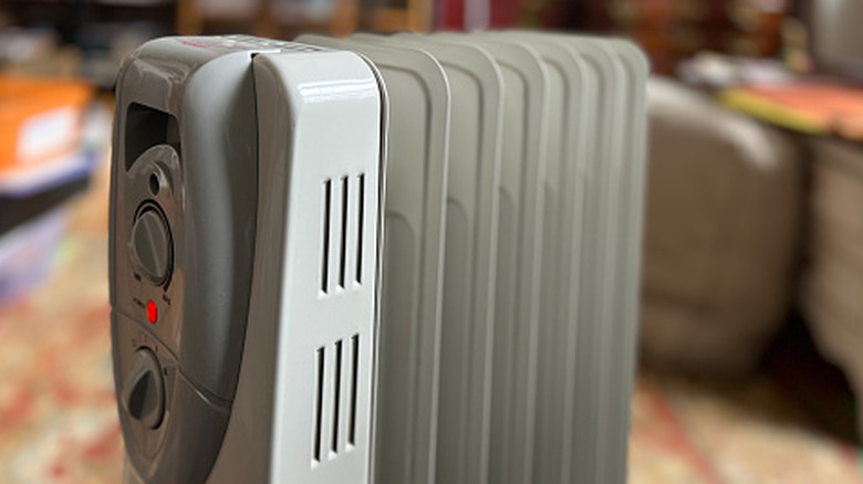 A closeup of a radiator-style space heater