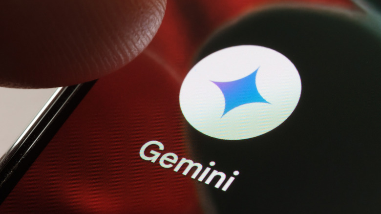 close up of a finger moving to tap the Gemini app icon on a smartphone screen