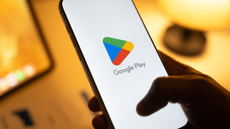 Google Play Store logo on a smartphone screen