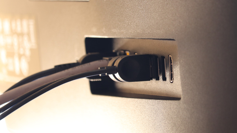 Back of monitor with cables running out of it