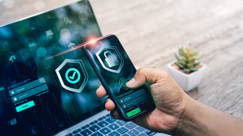 close-up concept of smartphone and PC security screen