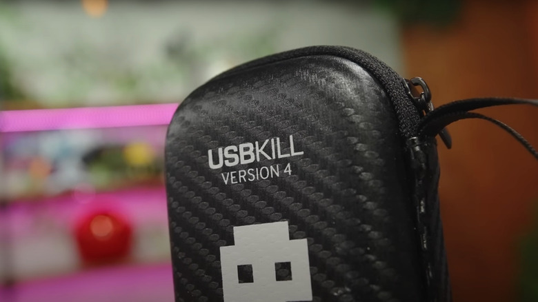 A close-up on the carrying case of a USB Kill Stick device.