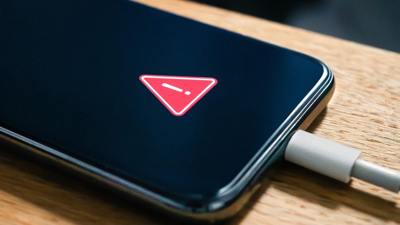 A smartphone being charged.