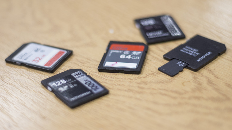 Multiple SD cards and SD card adapters.