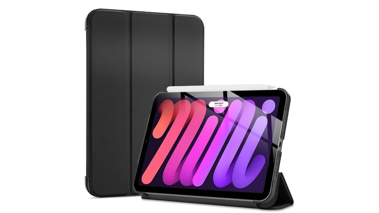 A simple black folio case next to an iPad with the case folded up as a stand