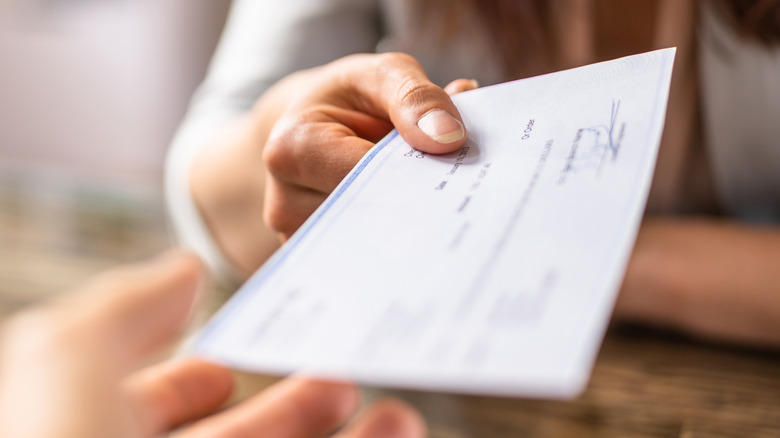 Personal holding out cheque