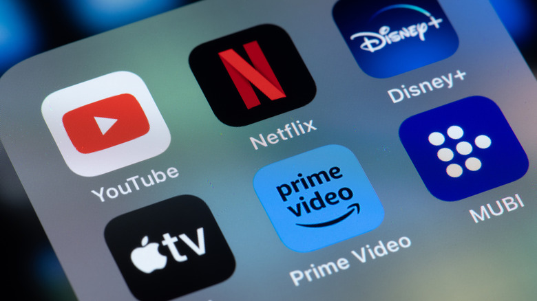 Netflix, Amazon Prime, Mubi, YouTube, Disney Plus and Apple TV app icons on iPhone screen