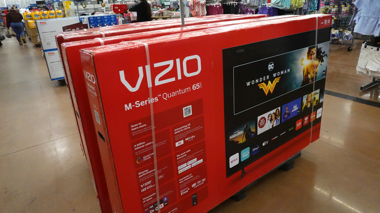 Vizio TVs in their boxes inside of a store.