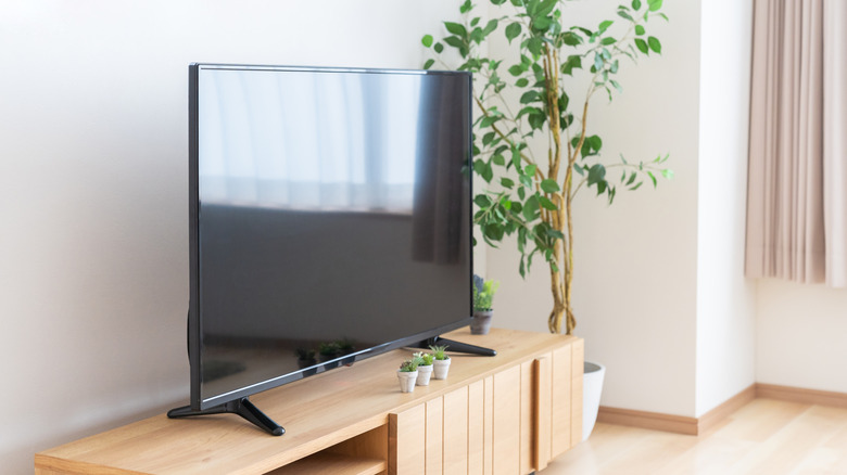 Modern TV on TV stand