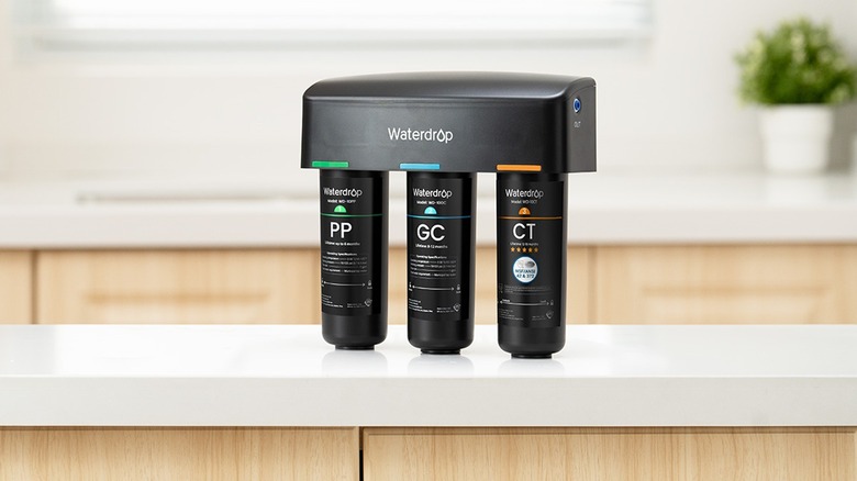 Waterdrop Filter's TSA 8 Layer Under Sink Water Filter System on a counter