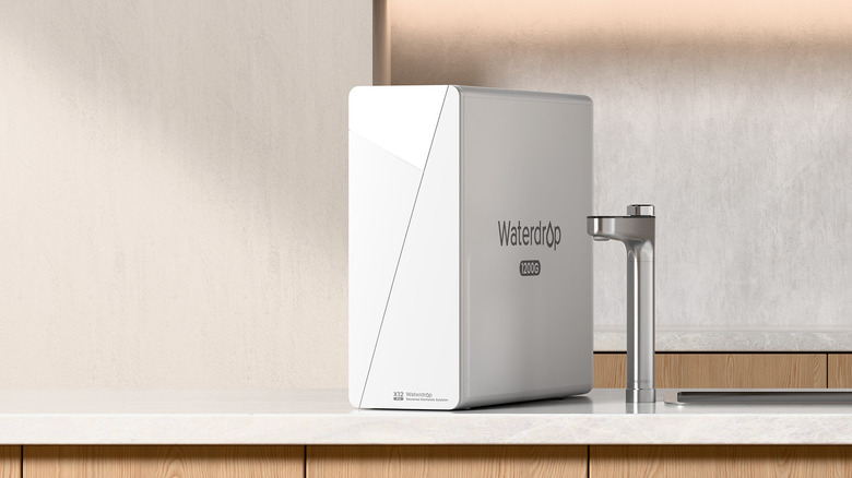Waterdrop Filter X12 Pro sitting next to a sink