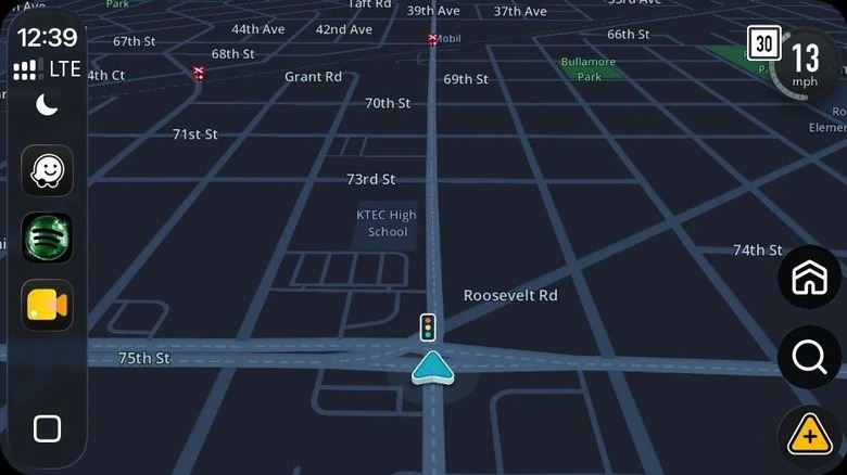 The Waze app showing traffic lights at an intersection.