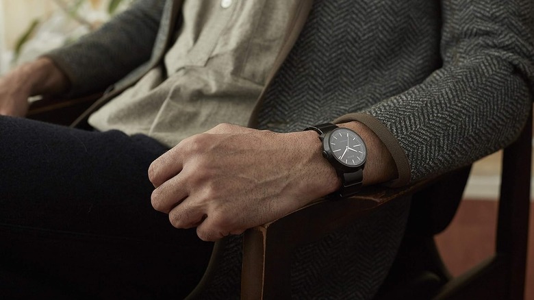 A person wearing the Sony Wena Wrist Pro