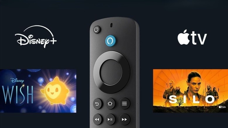 Close-up of an Amazon Fire TV Stick Remote with logos for Disney+, Apple TV, Disney's Wish, and Apple TV's Silo around it on a black background