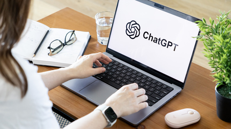A ChatGPT logo shown on a laptop.