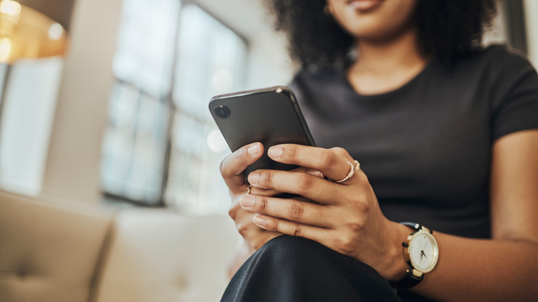 Young woman using a smartphone.
