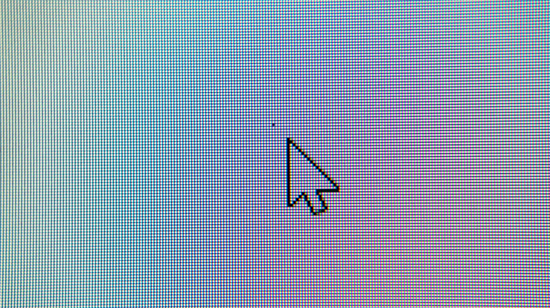 A mouse pointer pointing at a dead pixel.