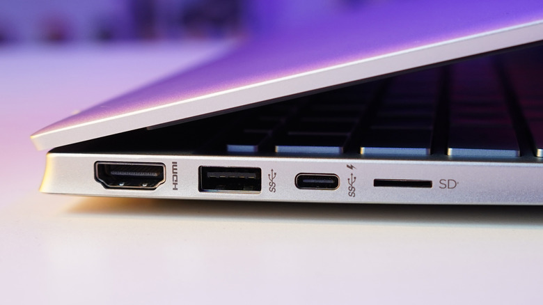 Thunderbolt 4 cable plugged into the side of a laptop