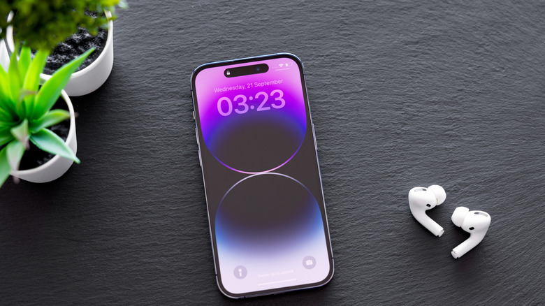 AirPods Pro next to an iPhone