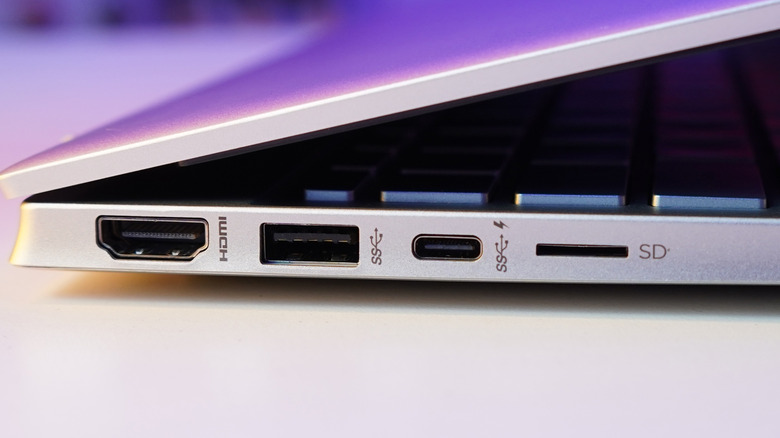 Close up of a laptop's ports, showing an HDMI, a USB-A, a USB-C, and a MicroSD port