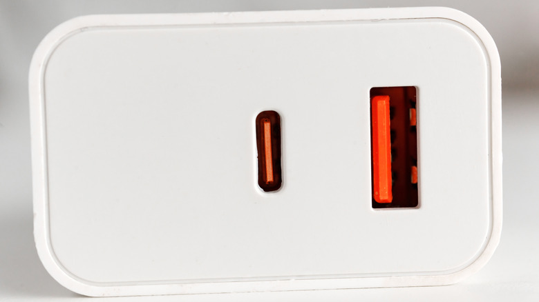 A photograph of a USB charger with USB Type-C and USB 3.1 Gen 2 ports.