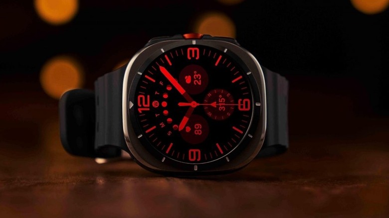 Samsung Galaxy Watch Ultra with red display on table