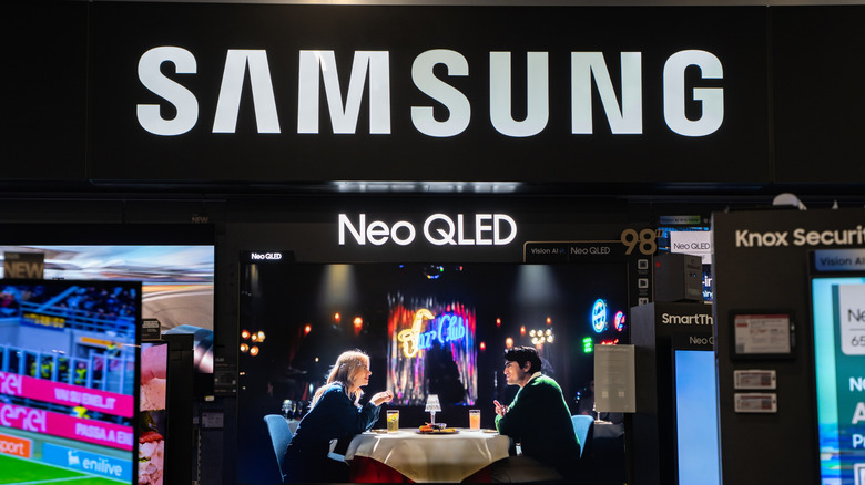 A Samsung Neo QLED display at what looks like a tech expo.