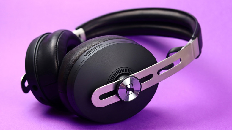 Sennheiser wireless headphones on purple background