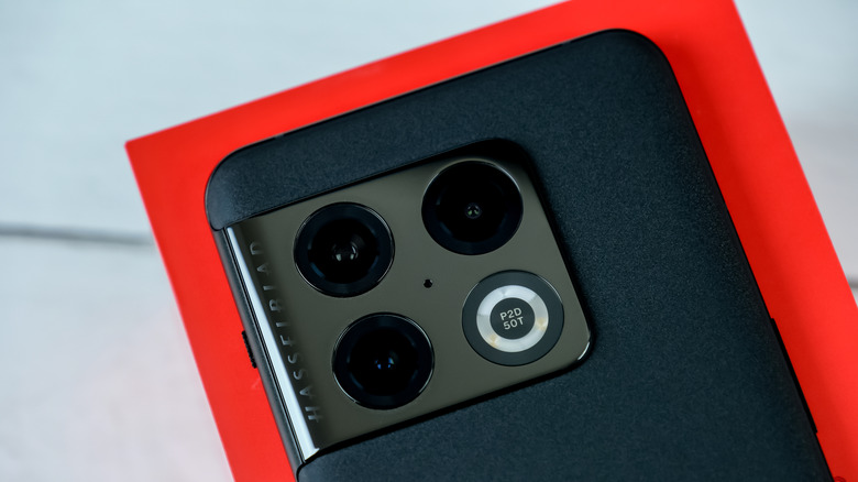Close-up of OnePlus smartphone's camera system.