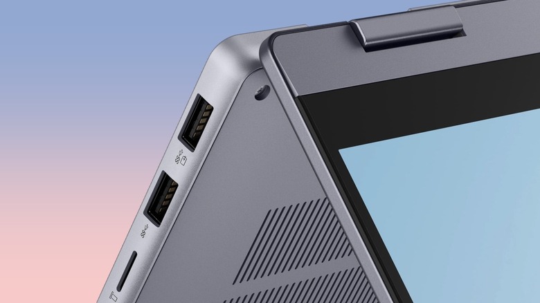 Close-up of the USB ports on a Lenovo IdeaPad 5i laptop showing the battery symbol