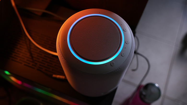 The top of a large Amazon Echo speaker displaying a blue light ring