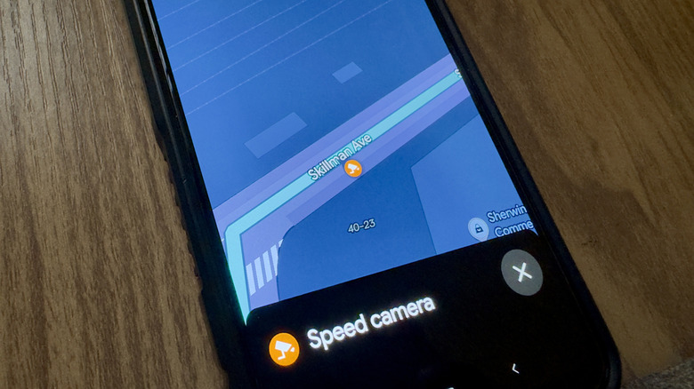 The Google Maps app showing the orange camera icon along a route
