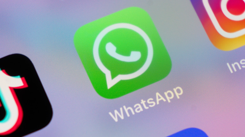 Close up of the WhatsApp icon on a screen